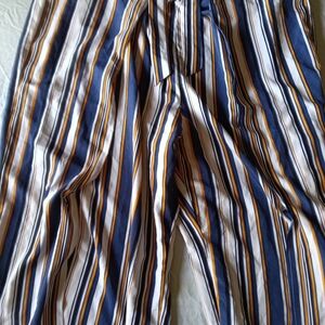 Elegant Striped Pantsuit in Navy, White, and Gold